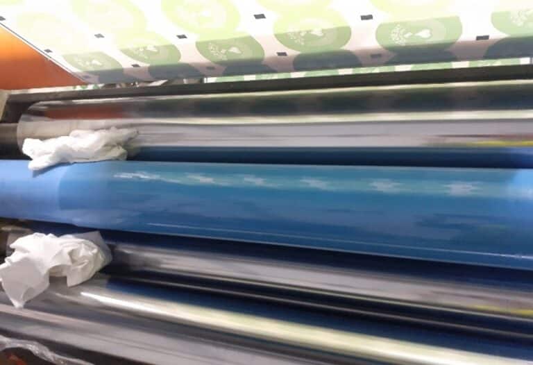 The machine and the rag caught between two in-running rollers